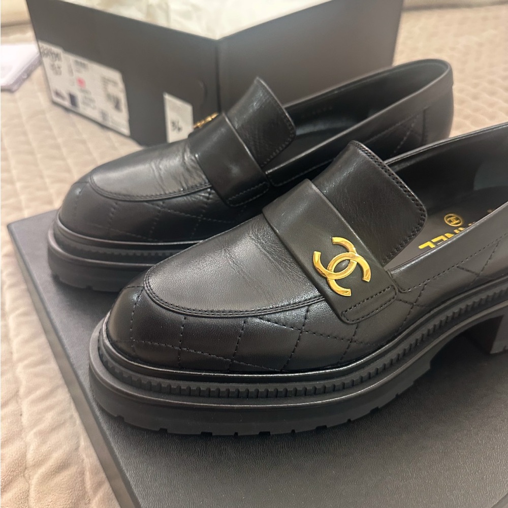 CHANEL Black Loafers with Gold Logo